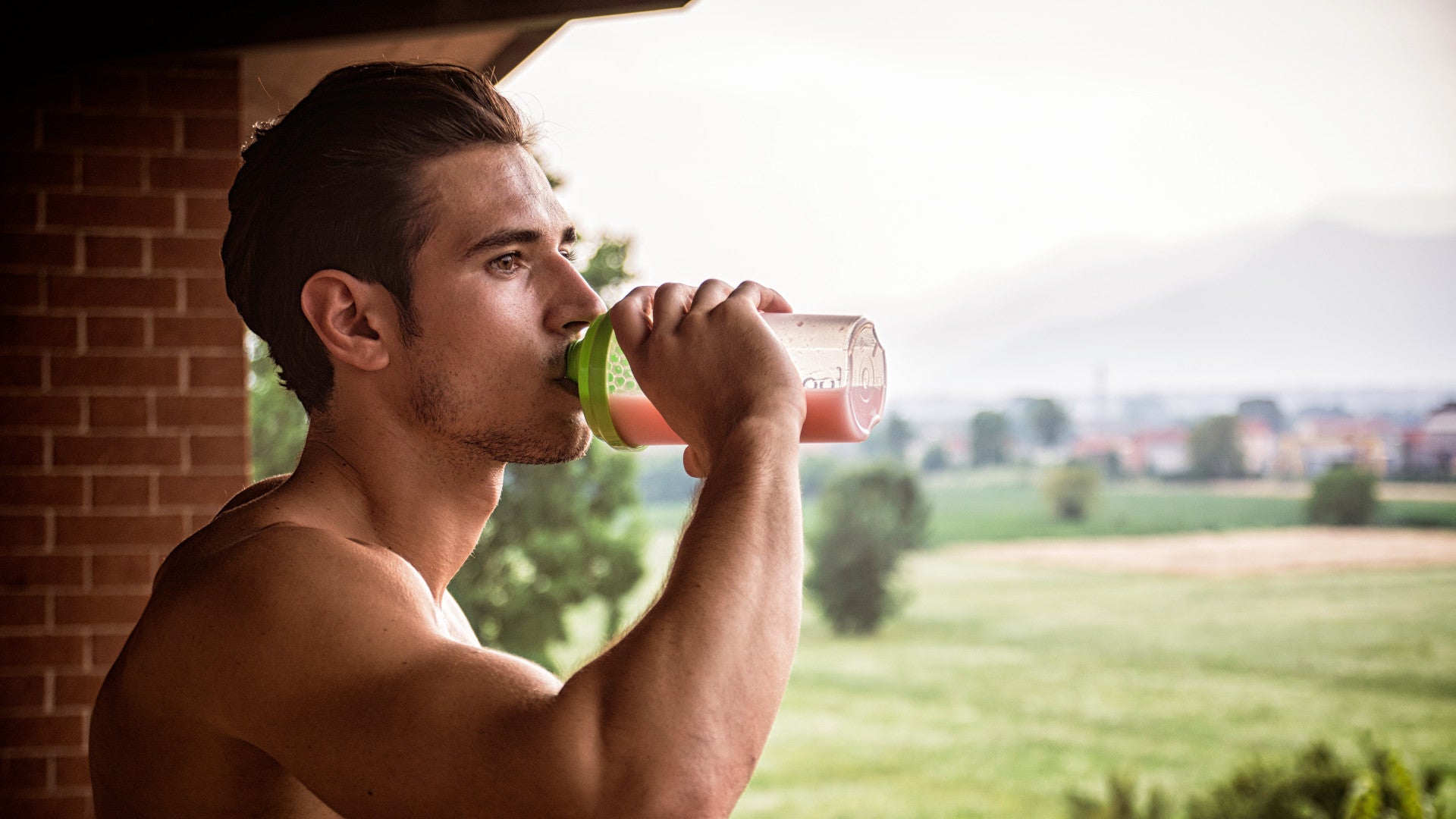 Man drinking mass gainer shake