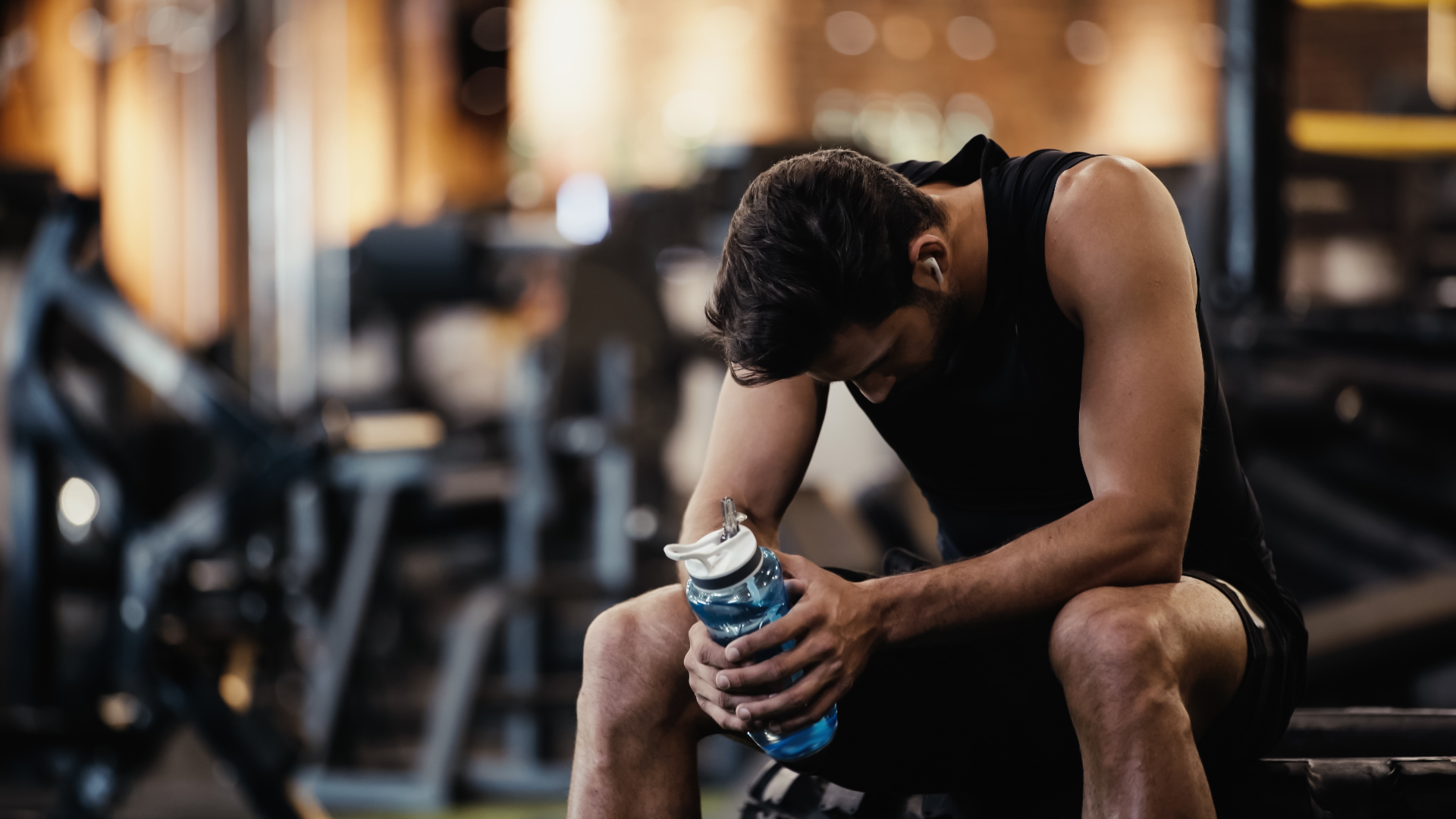 Tired man in the gym