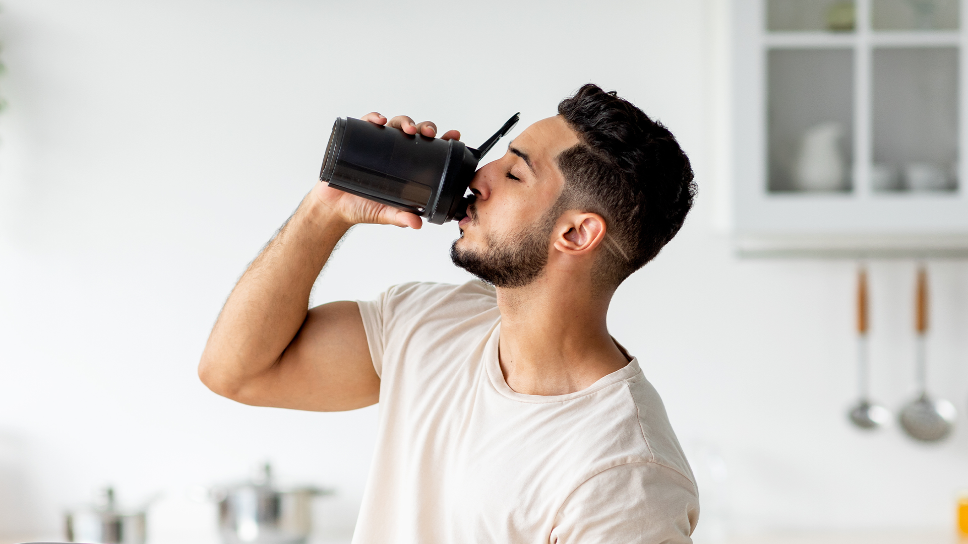 Man drinking protein powder