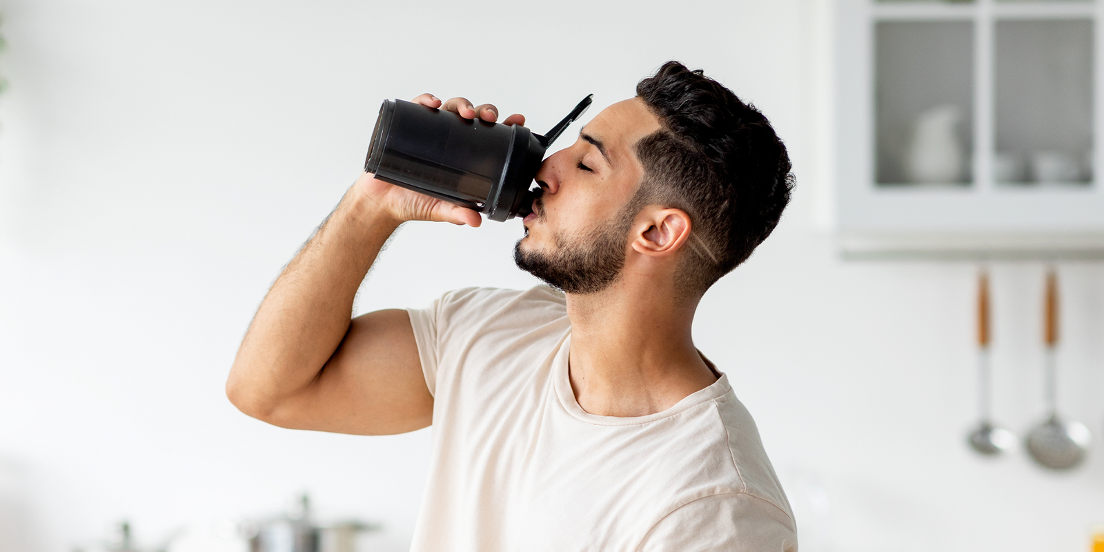 Man drinking protein powder